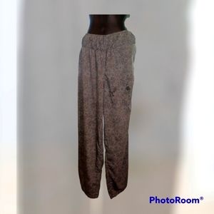 Blue colorful flare wrap around festival pants that skirt open around sides